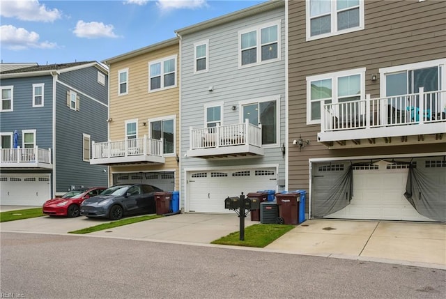 3102 Rollie Way, Chesapeake, VA 23323 - back of property with concrete driveway and an attached garage