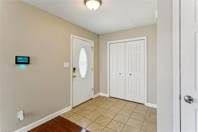 305 Roane Dr, Hampton, VA 23669 - foyer with baseboards and light tile patterned floors