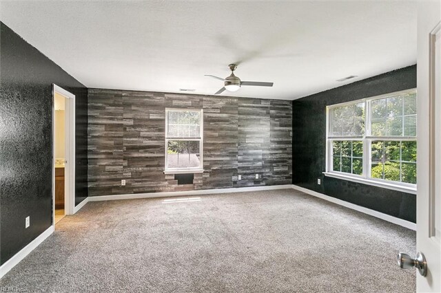305 Roane Dr, Hampton, VA 23669 - unfurnished room featuring a ceiling fan, carpet floors, and an accent wall