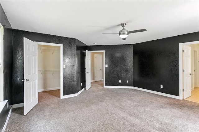 305 Roane Dr, Hampton, VA 23669 - unfurnished bedroom featuring light carpet, a spacious closet, ceiling fan, and a closet