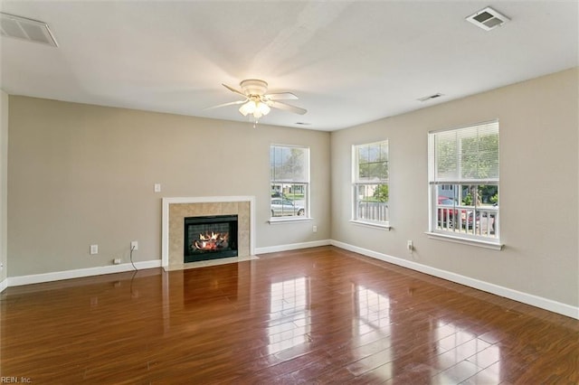 305 Roane Dr, Hampton, VA 23669 - unfurnished living room with ceiling fan, a fireplace, and wood finished floors