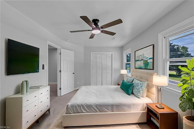 1226 Penniman Rd, Williamsburg, VA 23185 - bedroom with light colored carpet, a ceiling fan, and a closet