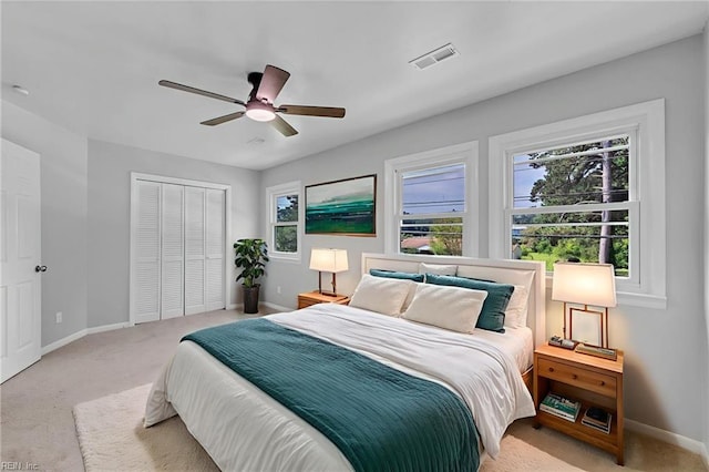 1226 Penniman Rd, Williamsburg, VA 23185 - bedroom with carpet floors, ceiling fan, and a closet