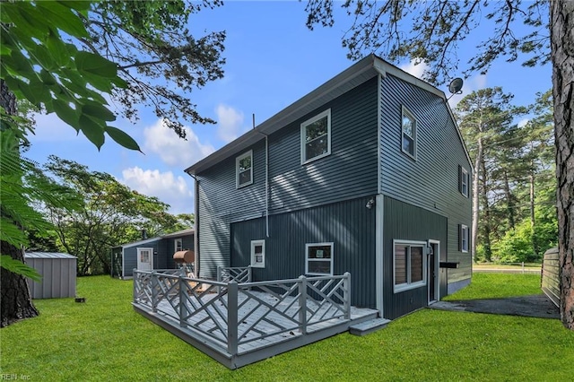 1226 Penniman Rd, Williamsburg, VA 23185 - back of property with a shed, a deck, and a yard