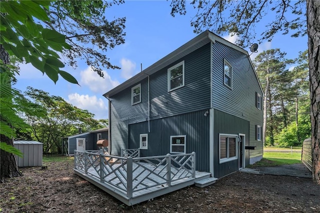 1226 Penniman Rd, Williamsburg, VA 23185 - back of house featuring a deck and a storage shed
