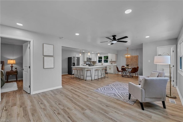1226 Penniman Rd, Williamsburg, VA 23185 - living area with ceiling fan, light wood-style floors, and recessed lighting