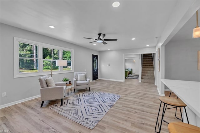 1226 Penniman Rd, Williamsburg, VA 23185 - sitting room featuring stairway, light wood finished floors, a ceiling fan, and recessed lighting