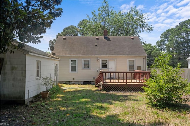 8048 Tidewater Dr, Norfolk, VA 23505 - back of property featuring a deck, a chimney, and roof with shingles