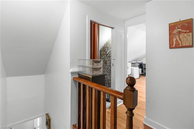 8048 Tidewater Dr, Norfolk, VA 23505 - corridor with wood finished floors, an upstairs landing, and vaulted ceiling