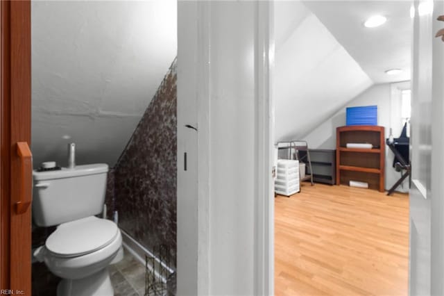 8048 Tidewater Dr, Norfolk, VA 23505 - bathroom featuring vaulted ceiling and wood finished floors