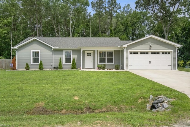 116 B St, Moyock, NC 27958 - ranch-style house featuring an attached garage, driveway, roof with shingles, and view of scattered trees