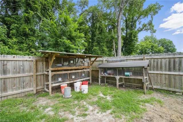 116 B St, Moyock, NC 27958 - fenced backyard featuring exterior structure and an outbuilding