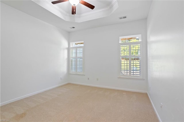 4048 Coronation, Williamsburg, VA 23188 - unfurnished room featuring plenty of natural light, a raised ceiling, light carpet, a ceiling fan, and crown molding