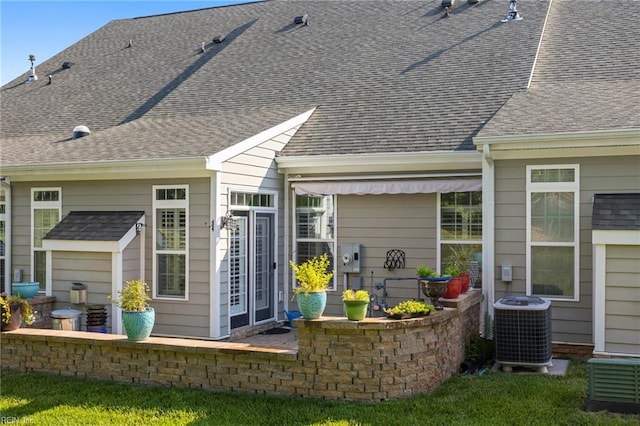4048 Coronation, Williamsburg, VA 23188 - back of property with a patio and roof with shingles