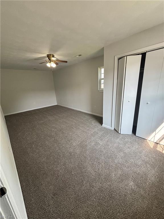 219 Gale Ave, Chesapeake, VA 23323 - unfurnished bedroom with carpet, a closet, and ceiling fan