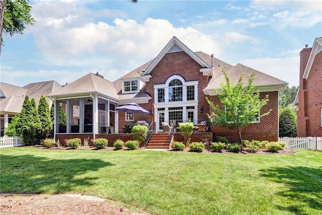 1808 John Hancock Rd, Williamsburg, VA 23185 - view of front facade with a sunroom and brick siding