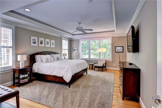 1808 John Hancock Rd, Williamsburg, VA 23185 - bedroom with a tray ceiling, crown molding, light wood-type flooring, and recessed lighting