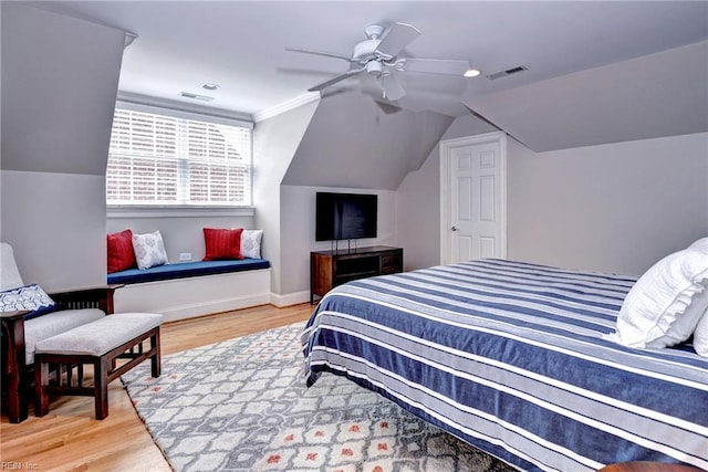 1808 John Hancock Rd, Williamsburg, VA 23185 - bedroom featuring wood finished floors, vaulted ceiling, and ceiling fan