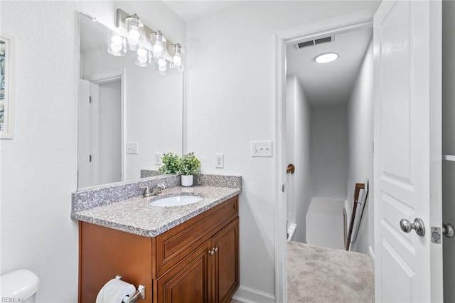 3520 S Warwick Cir, Norfolk, VA 23513 - bathroom with vanity and a textured wall