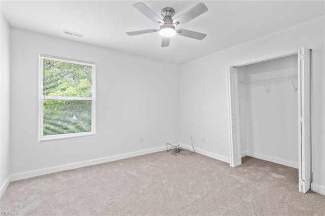 3520 S Warwick Cir, Norfolk, VA 23513 - unfurnished bedroom with carpet, a closet, and a ceiling fan