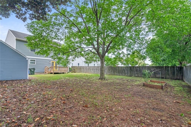 3520 S Warwick Cir, Norfolk, VA 23513 - fenced backyard with a wooden deck