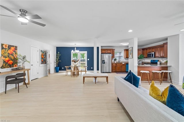 3520 S Warwick Cir, Norfolk, VA 23513 - living room with a chandelier, light wood-style flooring, a ceiling fan, and recessed lighting