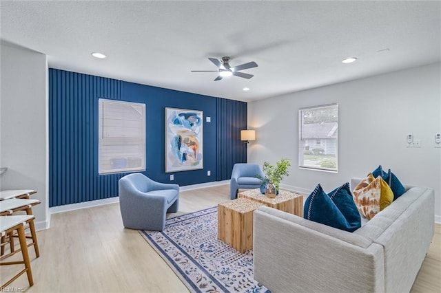 3520 S Warwick Cir, Norfolk, VA 23513 - living area featuring ceiling fan, wood finished floors, an accent wall, and recessed lighting