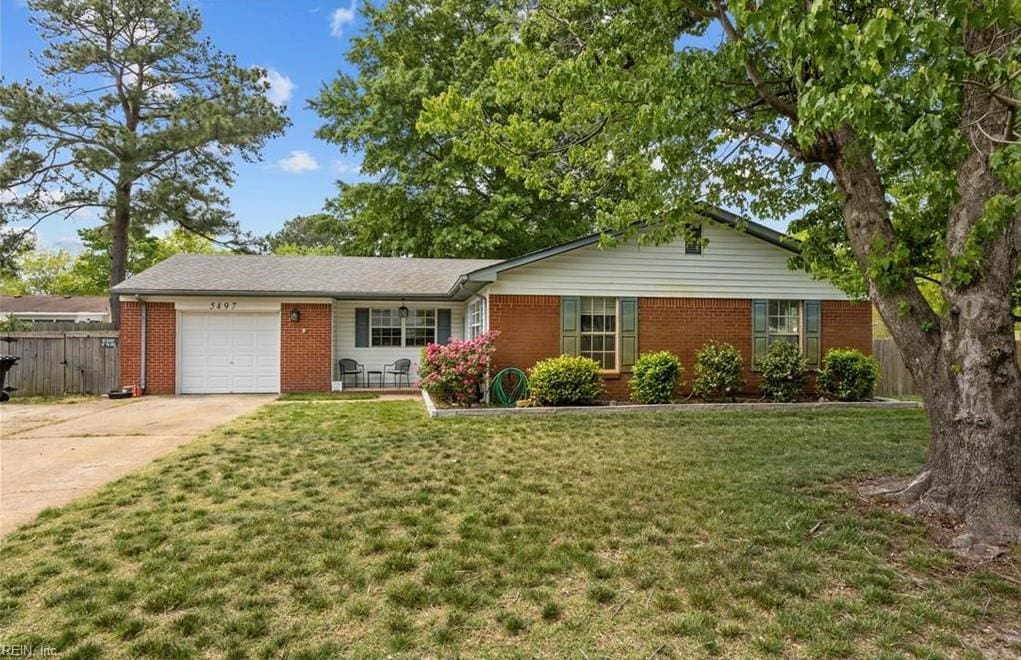 5497 Rutledge Rd, Virginia Beach, VA 23464 - single story home with brick siding, an attached garage, and concrete driveway