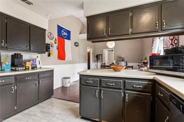 1408 Planting Ct, Virginia Beach, VA 23453 - kitchen with dishwasher, stainless steel microwave, light countertops, a peninsula, and a wainscoted wall
