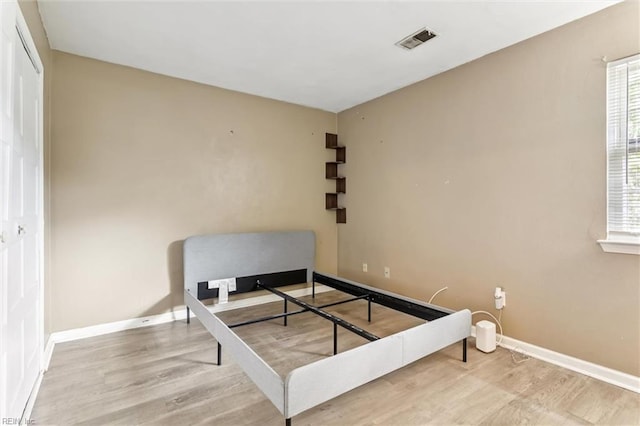 1408 Planting Ct, Virginia Beach, VA 23453 - bedroom with wood finished floors and multiple windows