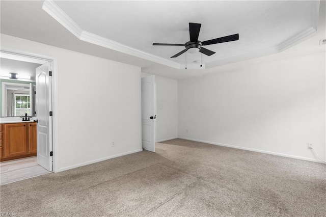 1028 Cathedral Dr, Suffolk, VA 23434 - unfurnished room with a raised ceiling, crown molding, light carpet, and ceiling fan