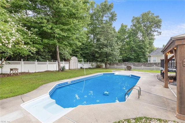 1028 Cathedral Dr, Suffolk, VA 23434 - view of swimming pool featuring a fenced backyard, a patio area, and a storage unit