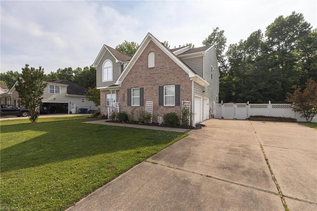 1028 Cathedral Dr, Suffolk, VA 23434 - traditional home with brick siding, driveway, and a garage