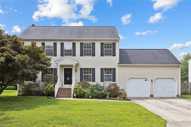 208 Sherbrooke Dr, Newport News, VA 23602 - colonial house with driveway, a front yard, an attached garage, and roof with shingles