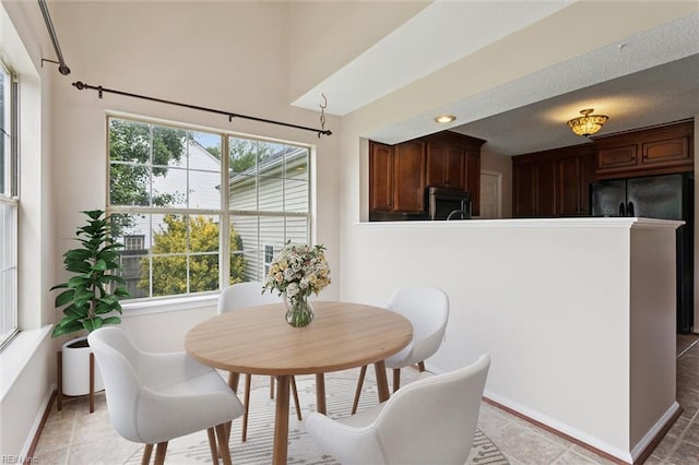 208 Sherbrooke Dr, Newport News, VA 23602 - dining area featuring baseboards and light tile patterned flooring