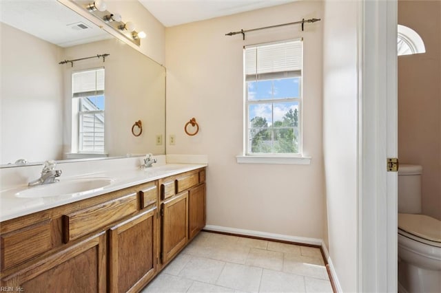 208 Sherbrooke Dr, Newport News, VA 23602 - full bathroom featuring double vanity, healthy amount of natural light, and tile patterned flooring