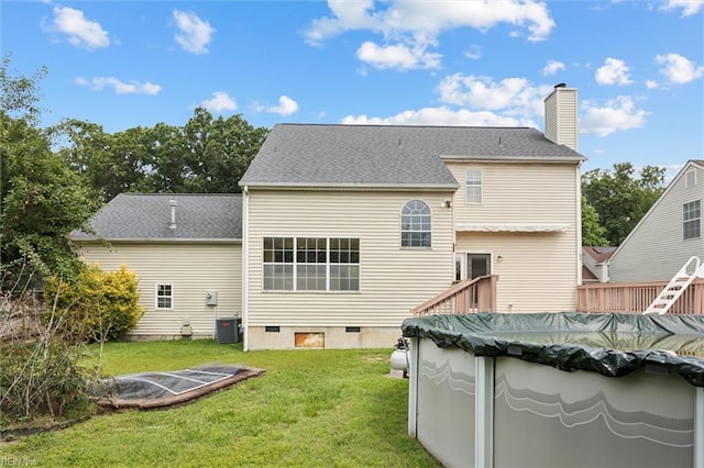 208 Sherbrooke Dr, Newport News, VA 23602 - back of property with crawl space, a yard, a covered pool, and a chimney