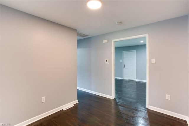194 Railroad St, Williamsburg, VA 23185 - unfurnished room featuring baseboards and dark wood-type flooring