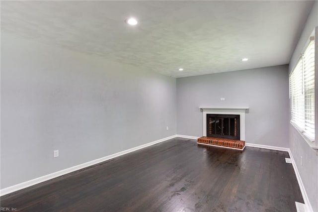 194 Railroad St, Williamsburg, VA 23185 - unfurnished living room featuring a fireplace, dark wood finished floors, and recessed lighting