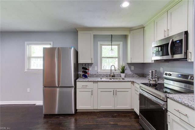 194 Railroad St, Williamsburg, VA 23185 - kitchen featuring stainless steel appliances, plenty of natural light, dark wood finished floors, light stone countertops, and recessed lighting