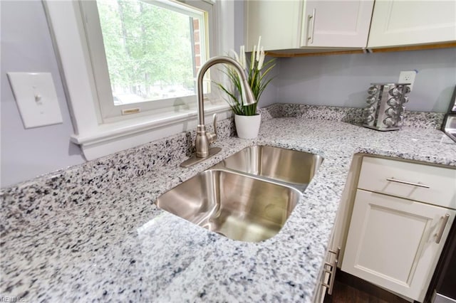 194 Railroad St, Williamsburg, VA 23185 - kitchen view of light stone counters and white cabinetry