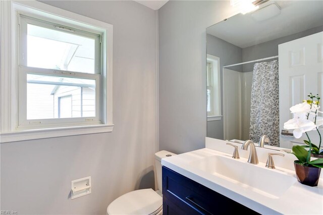 194 Railroad St, Williamsburg, VA 23185 - full bath featuring healthy amount of natural light, vanity, and a shower with shower curtain