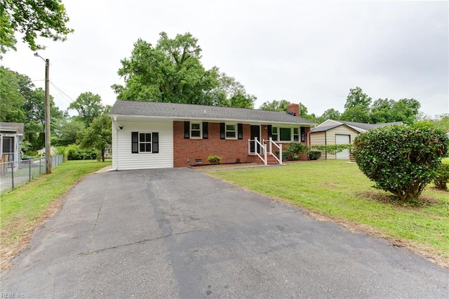 194 Railroad St, Williamsburg, VA 23185 - ranch-style house with brick siding, driveway, and a chimney