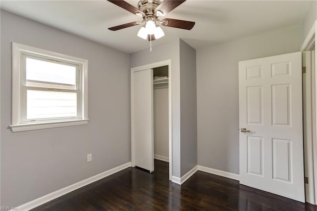 194 Railroad St, Williamsburg, VA 23185 - unfurnished bedroom featuring dark wood-style flooring, a closet, and ceiling fan
