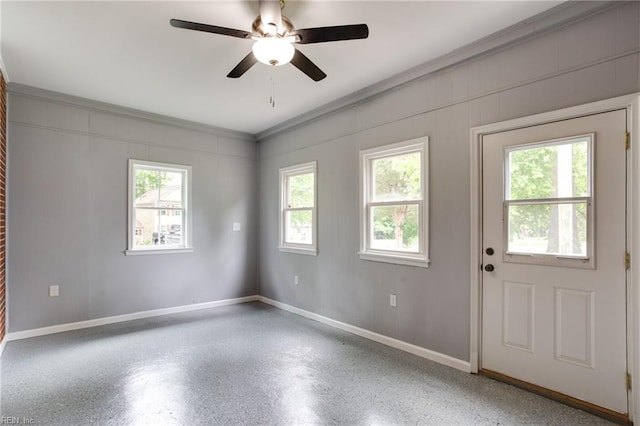 194 Railroad St, Williamsburg, VA 23185 - unfurnished room with a ceiling fan, crown molding, and speckle patterned floor