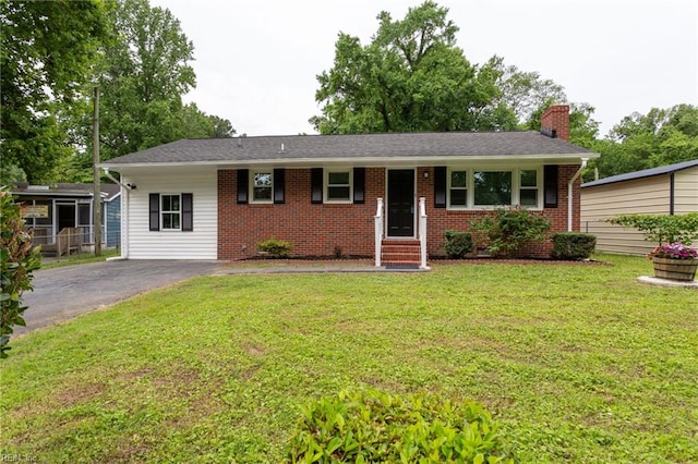 194 Railroad St, Williamsburg, VA 23185 - ranch-style home with a chimney, brick siding, a front lawn, entry steps, and driveway