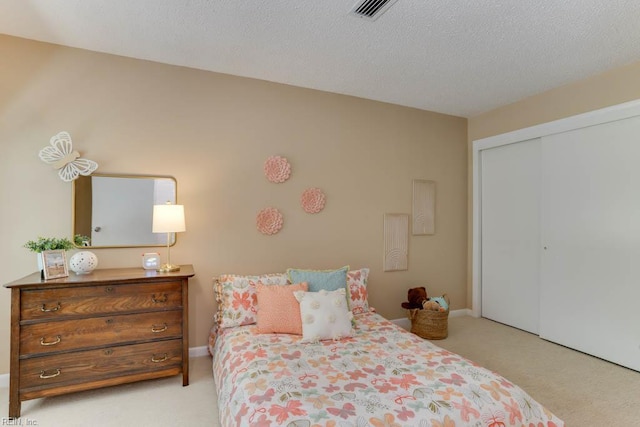 5225 Thatcher Way, Virginia Beach, VA 23456 - bedroom featuring light colored carpet, a closet, and a textured ceiling