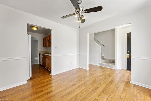 48 Terri Sue Ct, Hampton, VA 23666 - unfurnished room featuring a ceiling fan, stairway, and light wood finished floors