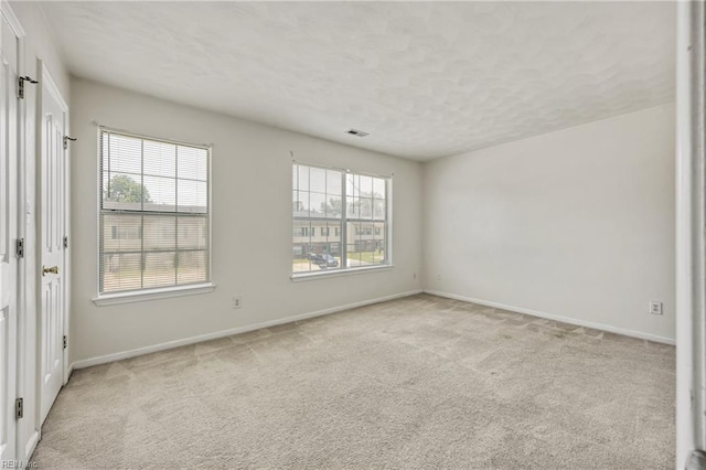 48 Terri Sue Ct, Hampton, VA 23666 - carpeted empty room with a textured ceiling and baseboards