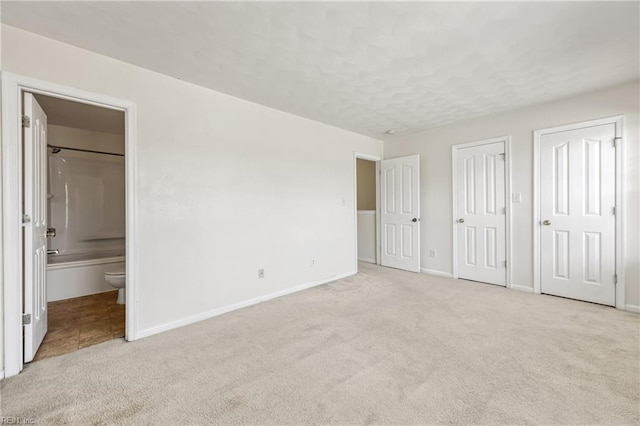 48 Terri Sue Ct, Hampton, VA 23666 - unfurnished bedroom with carpet, connected bathroom, and multiple closets